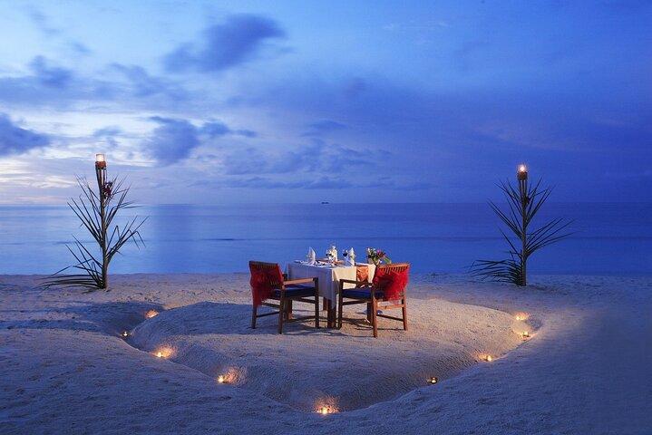 A couple enjoying a dinner on kendwa beach