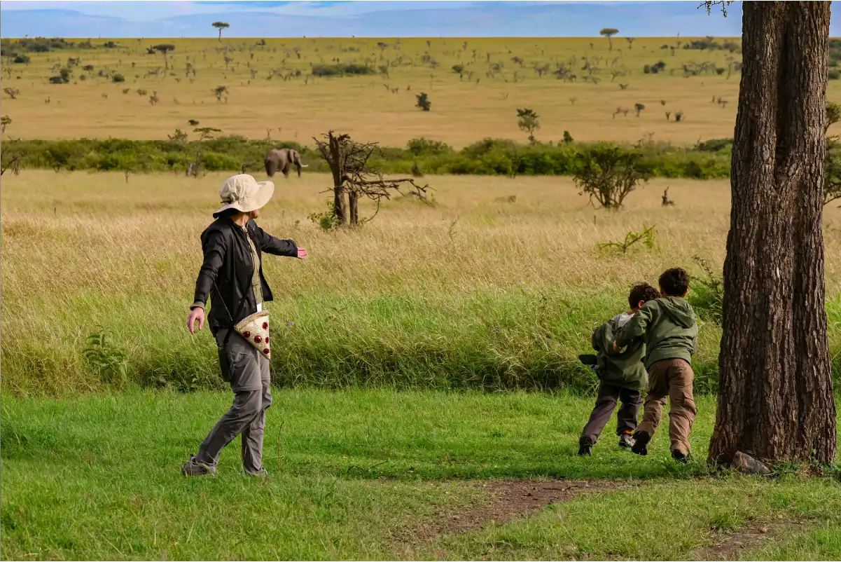 Eco-tourist on a walking safari in Tanzania practicing sustainable travel